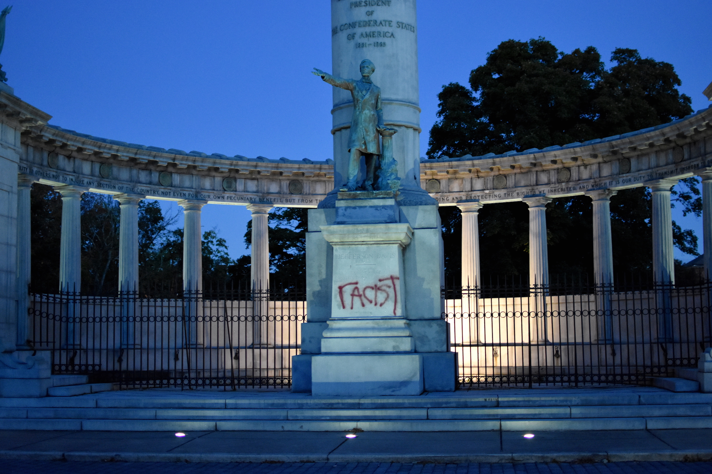 Photo of Jefferson Davis memorial in Richmond, Virginia with "racist" written in spray paint
